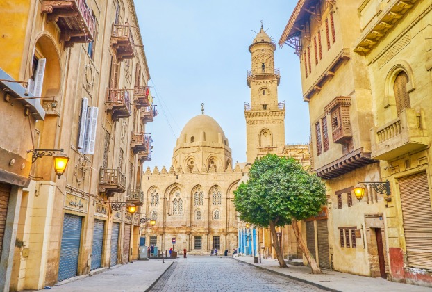 Historic street view with mosque and buildings