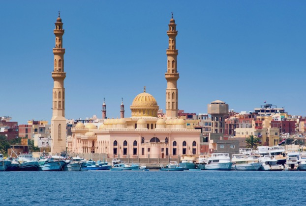 Scenic view of a mosque by the waterfront.